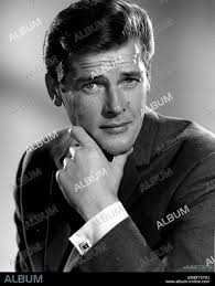 ROGER MOORE in THE SAINT, 1962, directed by LESLIE NORMAN and ROY WARD BAKER.  Copyright ITC/BARMORE/NEW WORLD PROD.