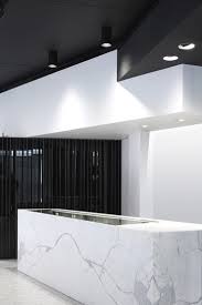 Sharp And Clean Elegant Counter Desk Kiasma Store By Yves Luyckx Minimalism Interior Design Commercial Interiors