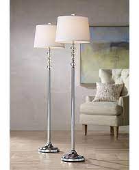 This simple mother/daughter floor lamp with reading light features a painted finish and plastic white shades. Floor Lamp Sets Matching Table Floor Designs Lamps Plus