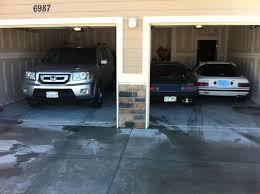 It is not uncommon for many families to find a car parked outside while a garage bay is full of lawn and garden equipment, bikes, and other. Car Garage Interior Design Ideas Decoration Large High Eiling Painted With Garage Design Interior Garage Design House Design
