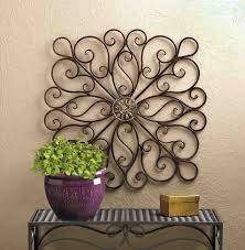 In a patinaed finished iron, each is gently. Iron Scroll Wall Art Ideas On Foter
