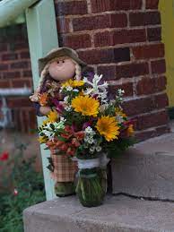 The little gift of flowers. Fall Designed By The Little Shop Of Flowers In Stillwater Ok For Information Call 405 372 1200 Fall Flower Arrangements Fall Flowers Flower Arrangements