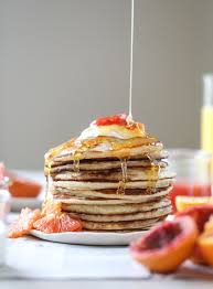 They're packed with over 16 grams of protein without an ounce of protein powder, making them the perfect pre/post workout fuel. Greek Yogurt Pancakes Greek Yogurt Pancakes With Warm Winter Citrus Recipe Greek Yogurt Pancakes Yogurt Pancakes How Sweet Eats