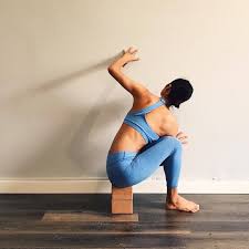Detail Depth Next We Take The Twist This Is A Pasasana To Parivrtta Parsvakonasnana Sequence At The Wall I Love That It Yoga Asanas Yoga Props Twist Yoga