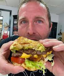 New member of the group, owner of a local business