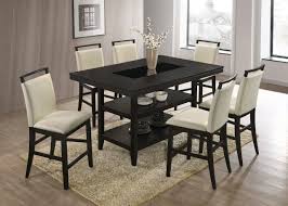 The white finish and two drawers for storage in the top provide a stylish dining solution for up to 6, or as a kitchen island for light meal prep. Tommy White Counter Height Table 6 Chairs Set New Arrival