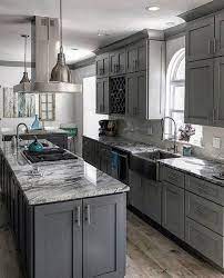 Brilliant lighting and hexagonal floor tiles make a big impact in this industrial kitchen [design: 57 Characteristics Of Grey Kitchen Ideas Refined Interior Designs 55 Classic Kitchen Design Grey Kitchen Designs Diy Kitchen Renovation