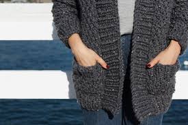 Short sleeved garter stitch cardigan knit with bulky yarn. Cliffside Cardigan Free Knitting Pattern Two Of Wands