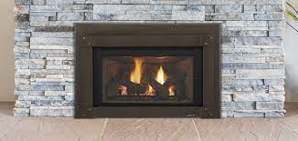 This is a great way to soften the transition from the harsh black edges of an insert to the rest of your space. Excursion Series Gas Fireplace Insert Quadra Fire