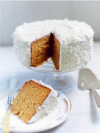 While cake is still warm, poke 15 to 20 holes in cake with the handle of a large wooden spoon; Simple And Delicious Desserts Cream Cheese Tart And Carrot And Coconut Cake Express Co Uk