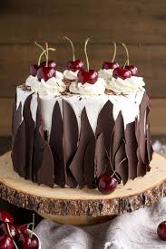 This Black Forest Cake Combines Rich Chocolate Cake Layers With Fresh Cherries Cherry Liqueur And A Simple Whipped Cream Frosting Cake Desserts No Bake Cake