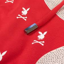 The bunny pullover hoodie has a classic hoodie construction with a plush playboy logo on the front and a neon brand logo on the left sleeve. Philipp Plein X Playboy Red Skull Bunny Hoodie Shop 375