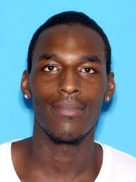 Three men charged in McDonald's shooting