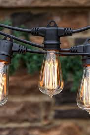 Tips for hanging string light on a deck using a piece of emt (electric metallic tube) to make a deck light pole and wire rope. 20 Color Changing Solar Raindrop Light String Patio Balcony Deck Gate Pool Tree Contemporary Garden String Lights Home Garden