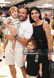 James Bye and Victoria Bye pose with children Edward