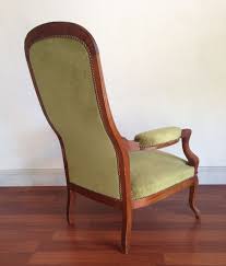voltaire chair an armchair with a low seat and a high back walnut armchair chair dining chairs
