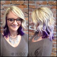 Blonde and blue hair can be a little different combination and that's great if you want to stand out! Blonde Highlights And Purple Peekaboo Underneath With Beach Wave Lob Hair Color Flamboyage Purple Highlights Blonde Hair Curly Hair Styles