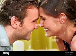 Close up couple kiss hi-res stock photography and images