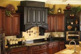 Prescott Rosewood Traditional Kitchen Darker Wood With Dark Countertops Lig Decorating Above Kitchen Cabinets Kitchen Cabinets Decor Above Kitchen Cabinets