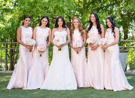 These bridesmaids wore blush bridesmaid gowns to this summer wedding featured on the knot. Your Essential Guide To Bridesmaid Etiquette