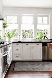 White Cabinets And With Black Granite Countertops Silver Hardware Kitchen Inspirations Kitchen Remodel Craftsman Kitchen