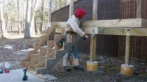 It's usually installed over hardwood or even tiled stairs and modern stair come adds style: Tips For Mounting Deck Stairs Fine Homebuilding