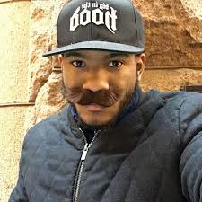 Frank Belluomini plays in the middle of State Street, causing a stir