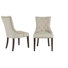 Simple elegance and romance defines the unblemished quality of our elouise upholstered dining chair with nailheads. Home Decorators Collection Bardell Upholstered Tufted Dining Chair With Biscuit Beige Seat And Nailheads Set Of 2 22 In W X 38 In H 3186 D Ch E B The H Dining Chairs