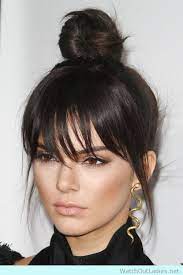 For those of you who want to try short hair, this is a great option. Messy Bun With Long Bangs Novocom Top
