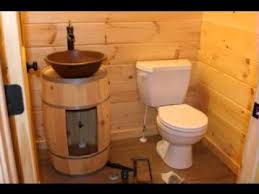 Simple diy bathroom ideas such as this one add extra storage for one of the smallest but most used rooms in your home. Log Cabin Half Bathrooms