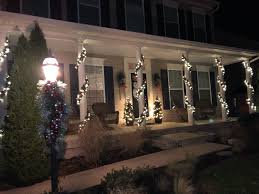 Check spelling or type a new query. Front Porch Column Christmas Garlands With White Lights Red Silver Ornaments Exterior Christmas Lights Holiday Lights Porch Christmas Porch Decor