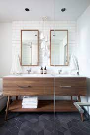 Bathroom vanities are a combination of both the sink and the surrounding storage and are sold in an endless array of sizes, finishes and styles. 5 Bathroom Mirror Ideas For A Double Vanity