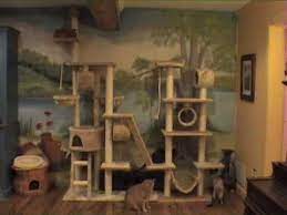 Known By Many Names Such As Cat Trees Cat Condos Cat Towers Cat Houses Or Simply Cat Furniture Whichever You Prefer Cat Tree Big House Cats Cat Playground