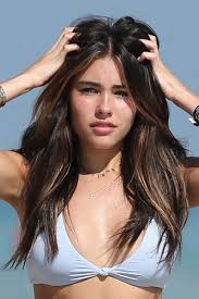 In this article, we cover maintenance tips and the hottest haircuts. Madison Beer Wavy Dark Brown Long Layers Peek A Boo Highlights Hairstyle Steal Her Style