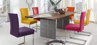 A Burst Of Colors From 20 Dining Sets With Multi Colored Chairs Home Design Lover Simple Kitchen Design Dining Room Colors White Kitchen Decor