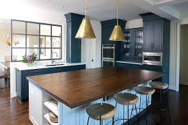 butcher block kitchen island with brass