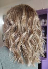 Here different shades of caramel dye have been used right from near the roots the brown caramel highlights as the rest of your hair gives a simple stylish look. Latte Curls Balayage Blonde Caramel Stylist Briighteyes Warm Blonde Hair Blonde Hair Shades Hair Color Caramel