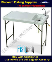 When you fold the table unscrew the faucet and unplug the quick connection. Fishtech Folding Fillet Camping Table With Faucet Discount Fishing