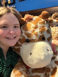 4.5 ft tall stuffed giraffe from Goodwill