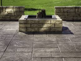 That being said, it only burns if lighter fluid, gasoline or plastic is covering it. Stamped Concrete Patio Designs With Fire Pit