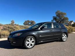 Image result for Sparkling Black 2007 Mazda3