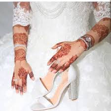 image may contain one or more people and shoes bridal mehendi designs bridal mehendi designs hands mehendi designs