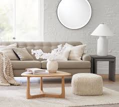 It also saves some space. Byron Waterfall Nesting End Tables Pottery Barn