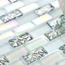 This is a simple but special design for the simple color and the inner water wave design on the background. Glass Subway Tile 1 X 2 Silver And Iridescent White Fifyh Com