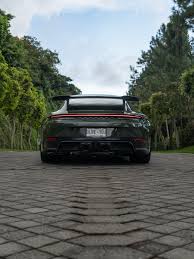Image result for Black Olive 2025 Porsche