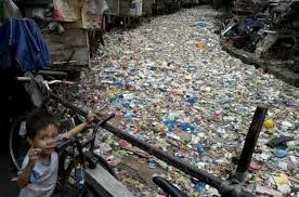 A Child Stands Next To An Actual River In The Philippines Full Of Trash It S Water Under There Somewhere Environmental Pollution Pollution Environment