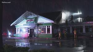 The krispy kreme on ponce de leon avenue has been a beloved landmark in midtown atlanta for decades and its glowing red sign was a beacon for hungry people at all hours of the day and night. Iconic Atlanta Krispy Kreme Damaged In Fire 11alive Com