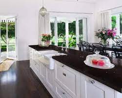 These unique kitchen types of granite countertops are black pearl granite and an angled ceiling. The Dark Side Black Quartz And Black Granite Countertops Compared