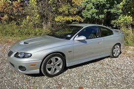 Image result for Dark Otter Gray 2004 Pontiac