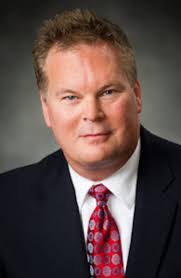 Local Marathon Winner, Law Firm Team Up for Military Family